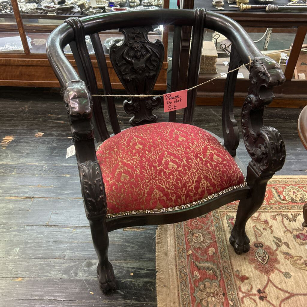 German Dark Wood Carved Chair, Red Pattern Upholstery.