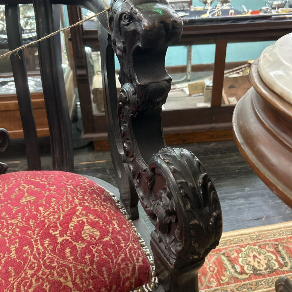 German Dark Wood Carved Chair, Red Pattern Upholstery.