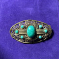 Art Deco brooch, Czechoslovakian c.1920-30. Brass Filigree, cabochon of Peking glass