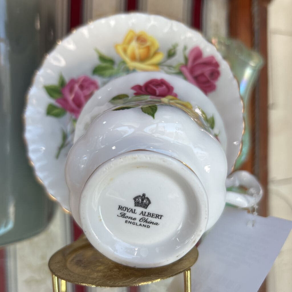 Vtg Royal Albert bone china teacup and saucer "pink yellow roses" England