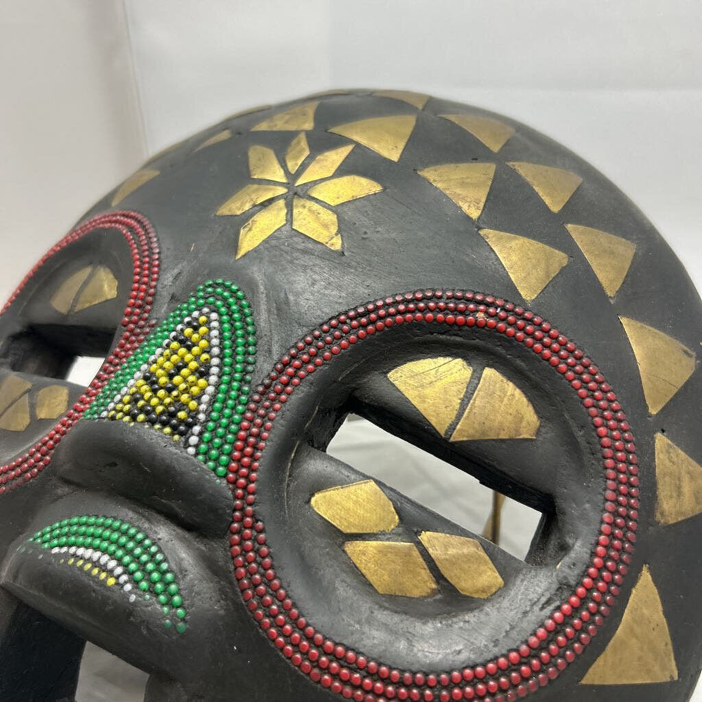 Carved wood ceremonial beaded with brass inlays tribal mask, made in Ghana.