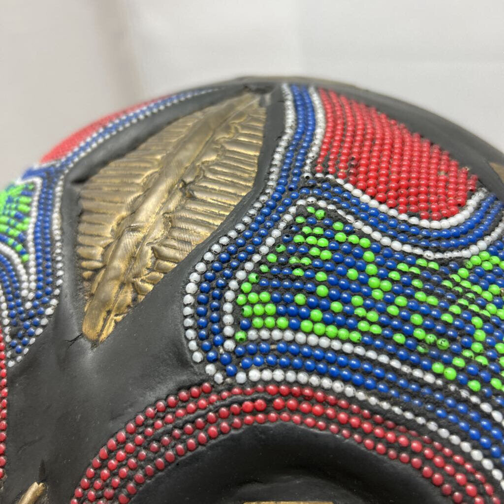 Carved wood ceremonial beaded with brass inlays tribal mask, made in Ghana.