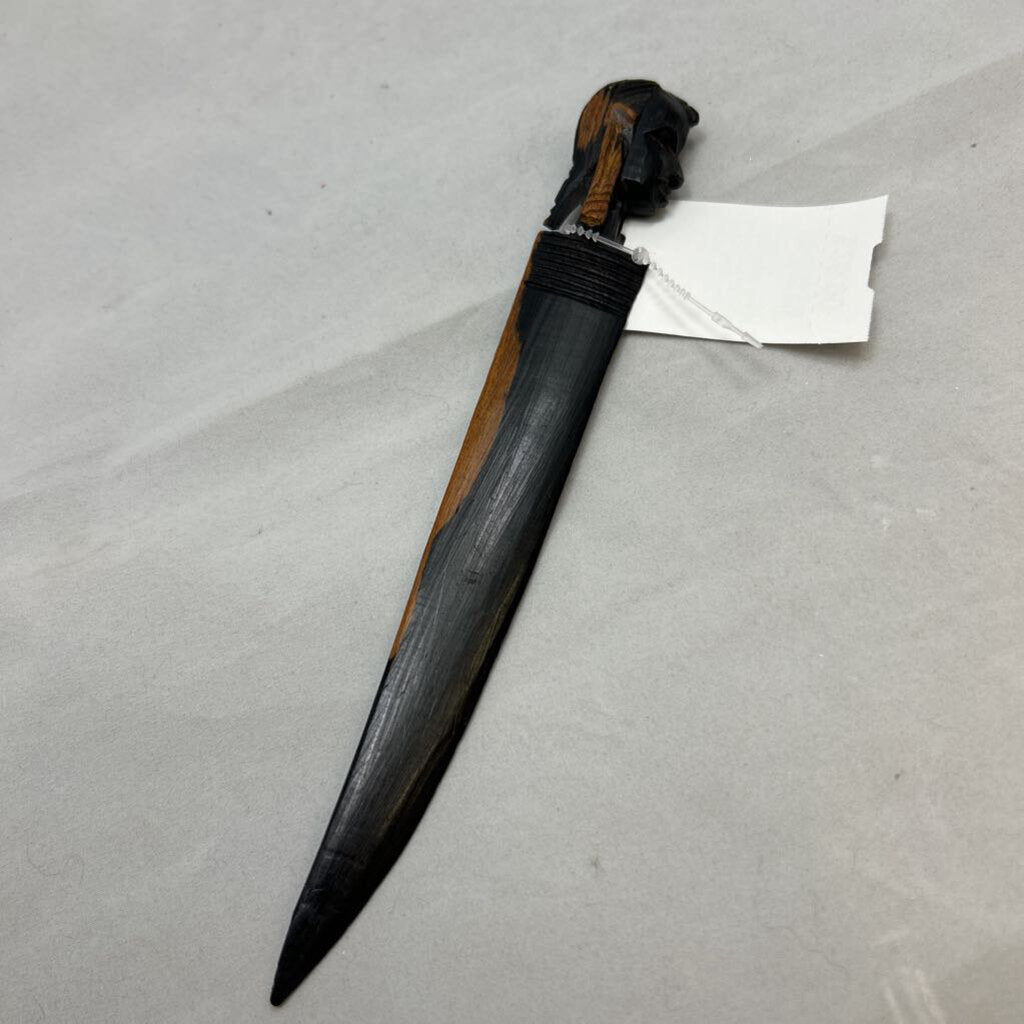 Vtg African letter opener featuring a dark wood handle hand-carved into a tribal head design.
