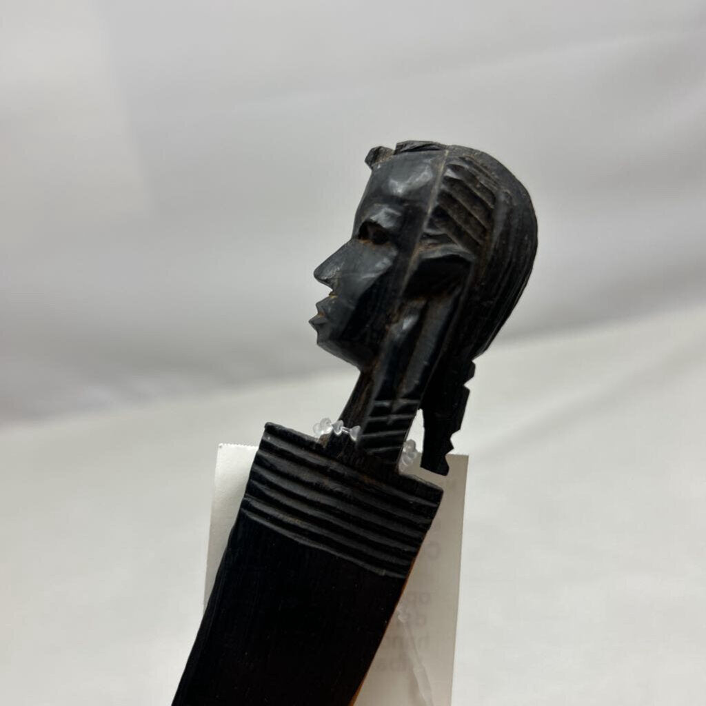 Vtg African letter opener featuring a dark wood handle hand-carved into a tribal head design.