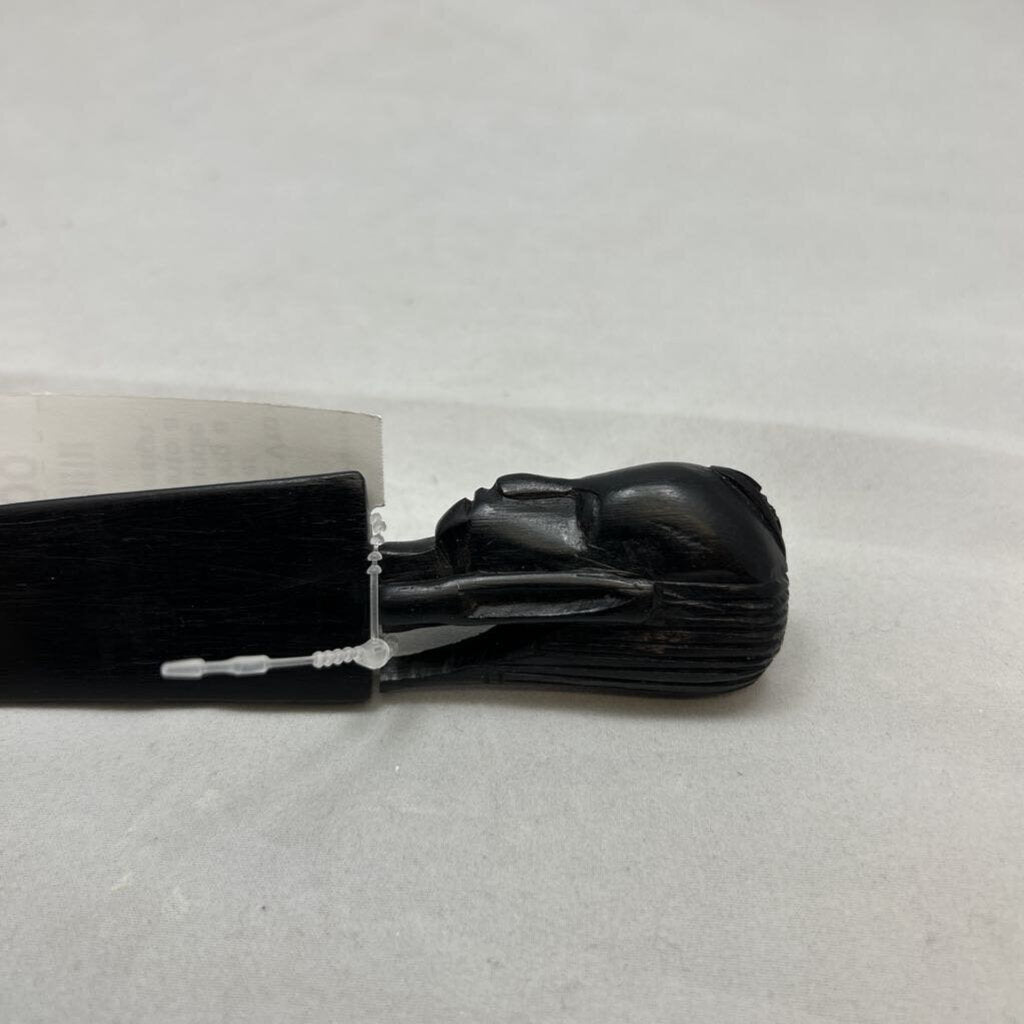 Vtg African letter opener featuring a dark wood handle hand-carved into a tribal head design.