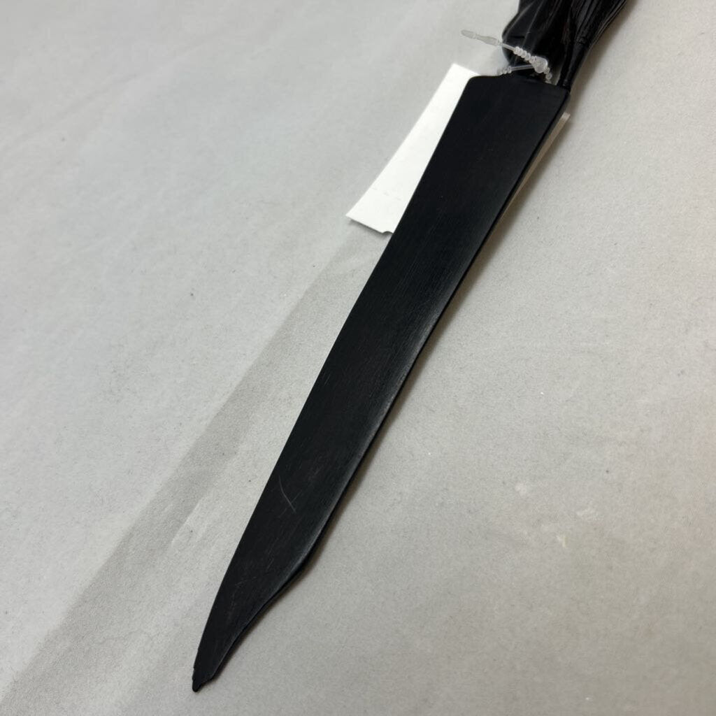 Vtg African letter opener featuring a dark wood handle hand-carved into a tribal head design.