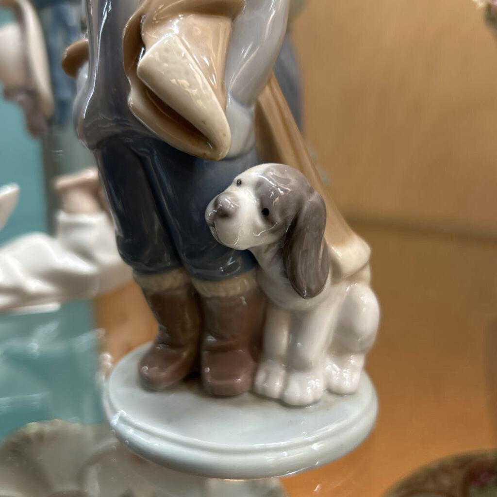 Lladro porcelain Fgurine "Winter Boy with Dog"