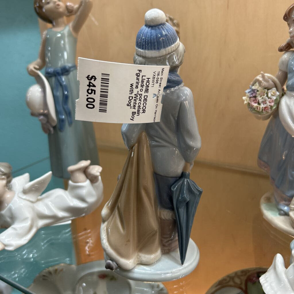 Lladro porcelain Fgurine "Winter Boy with Dog"