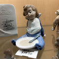Nao by Lladro " I'm Full" Figurine by Sculptor Jose Puche