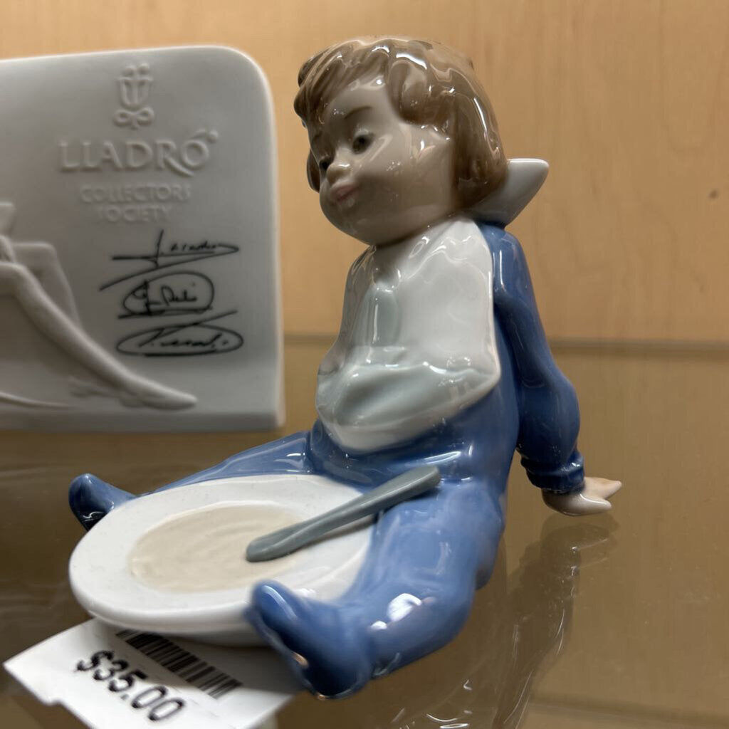 Nao by Lladro " I'm Full" Figurine by Sculptor Jose Puche