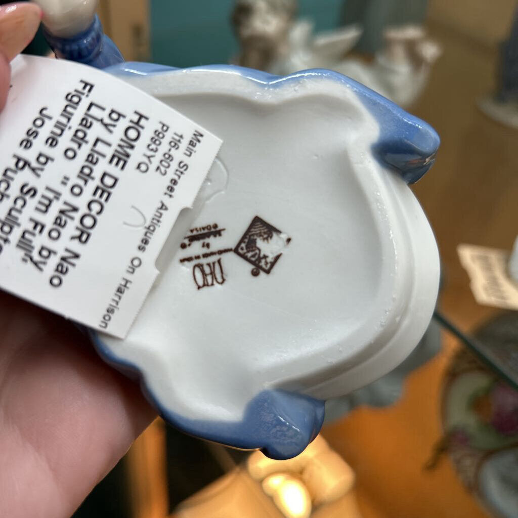Nao by Lladro " I'm Full" Figurine by Sculptor Jose Puche