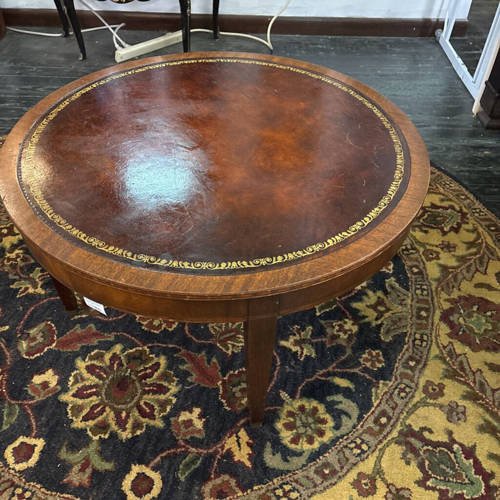 Weiman Furniture round mahogany cocktail table with tooled leather top ; circa 1930-50; model number 9320