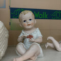 Andrea by Sadek Bisque porcelain "piano baby", sitting