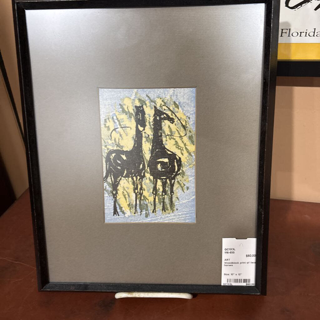 Woodblock print of two horses