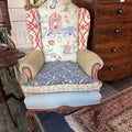 Chippendale revival wingback chair; Finely carved cabriole legs and apron in mahogany.