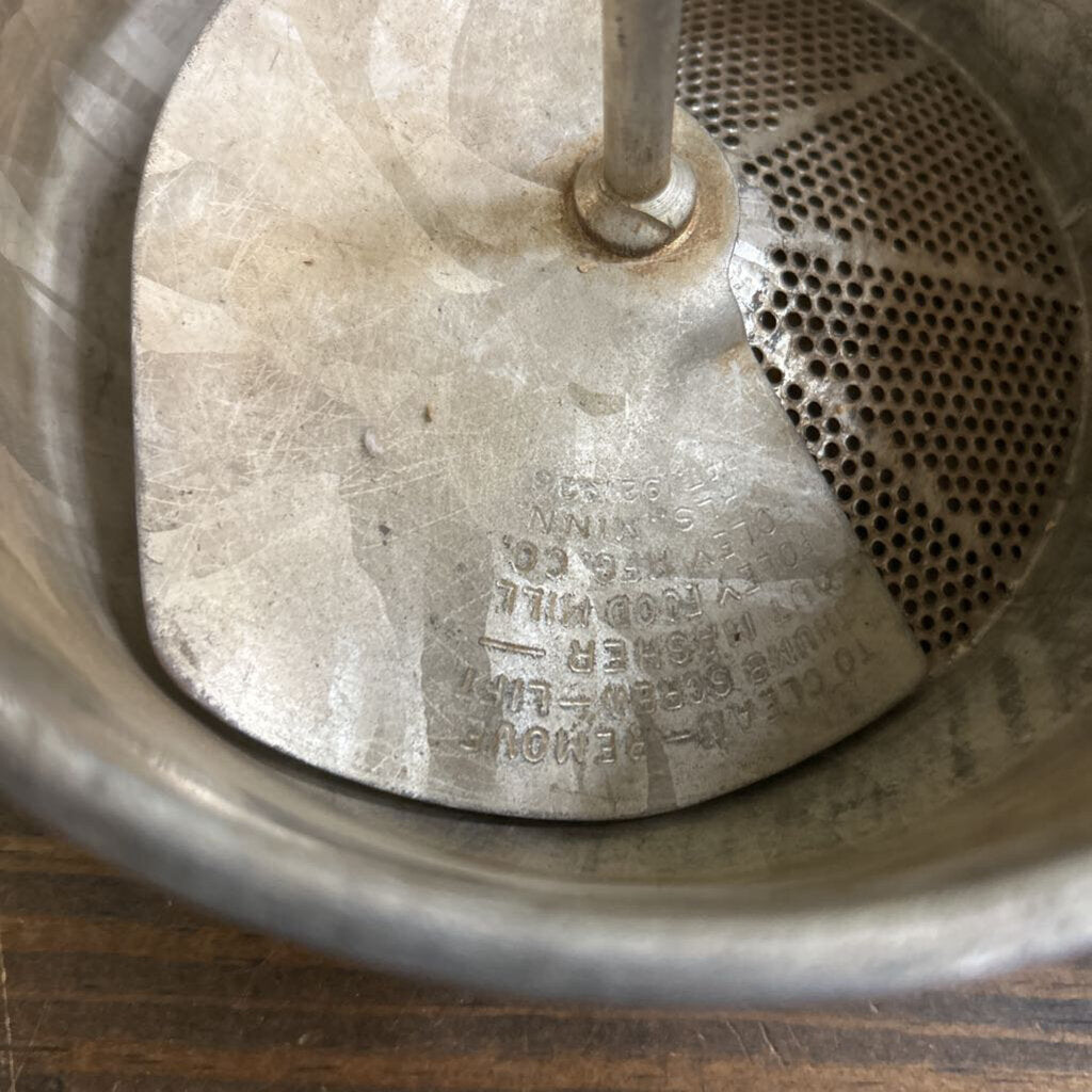 Foley Food Mill, Strainer Base and wooden handle, used for pureeing, ricing and straining fruits or vegetable. c.1930s.