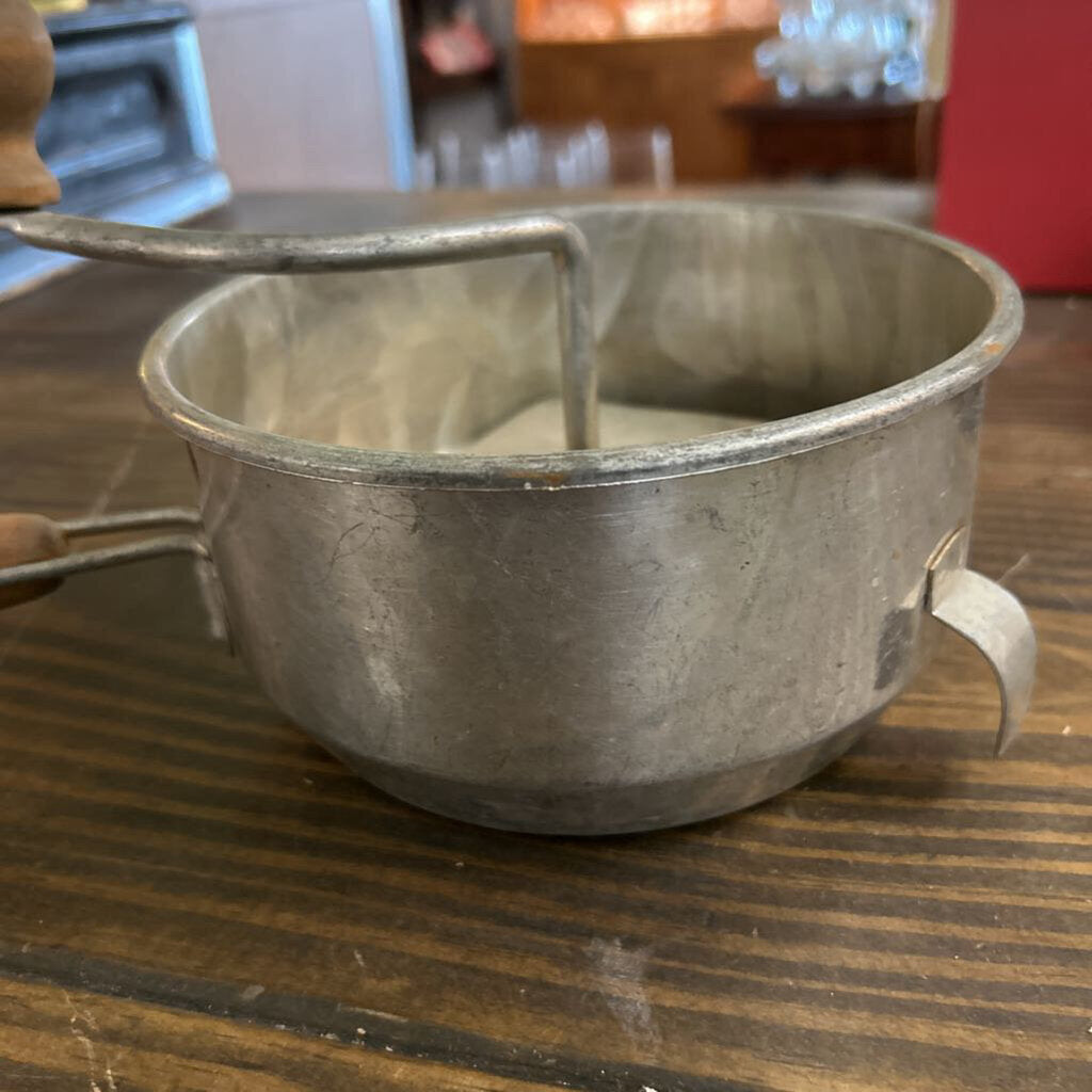 Foley Food Mill, Strainer Base and wooden handle, used for pureeing, ricing and straining fruits or vegetable. c.1930s.