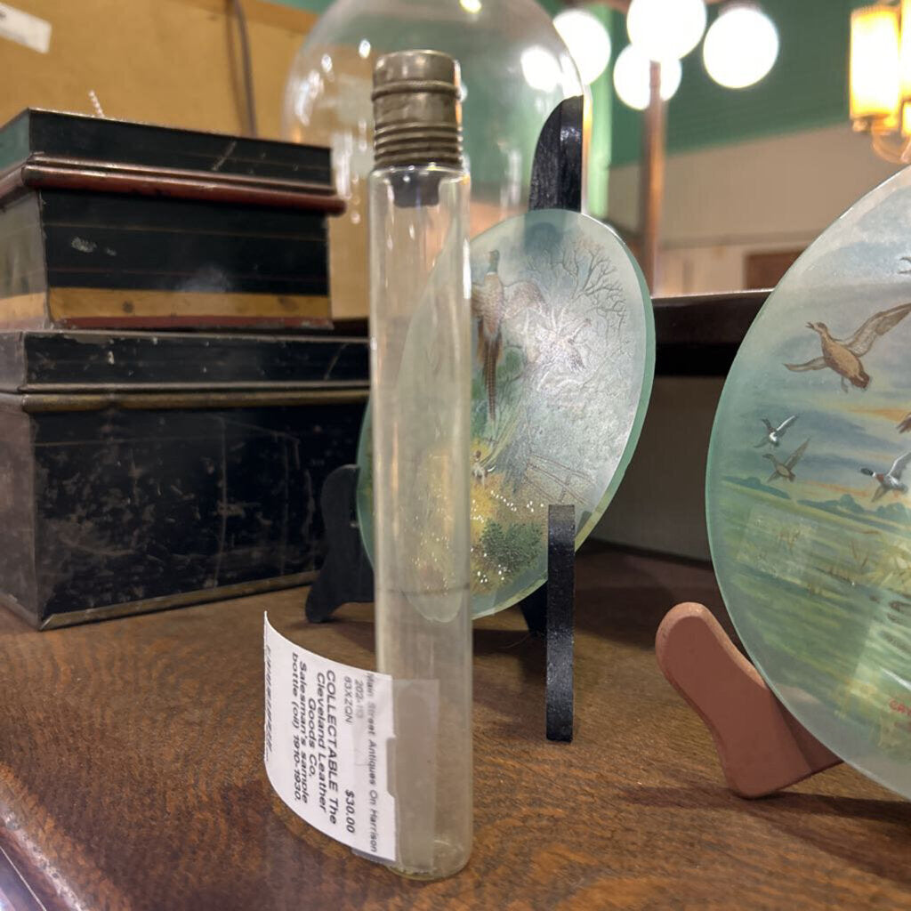 The Cleveland Leather Goods Co, Salesman's sample bottle (oil) 1910-1930.