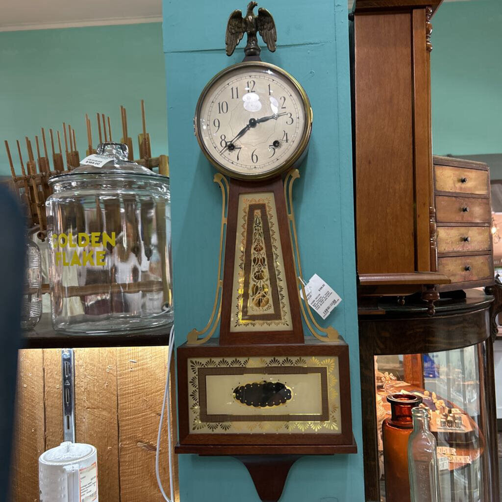 Seth Thomas "Brookfield-3w" banjo clock, c.1948. Wooden case, Brass side scrolls.
