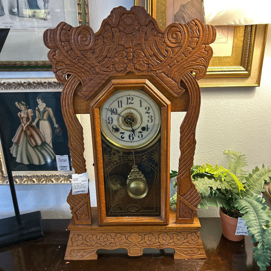 New Haven "Norwich Line" 8-Day Clock, c.1890-1910. New Haven Clock Co. Carved oak, gilt glass, Brass pend.