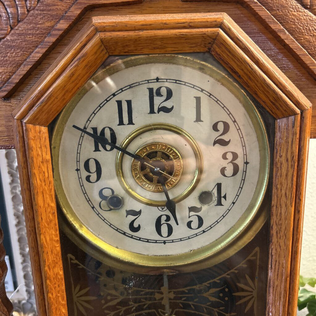 New Haven "Norwich Line" 8-Day Clock, c.1890-1910. New Haven Clock Co. Carved oak, gilt glass, Brass pend.