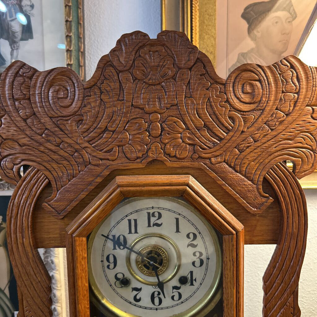 New Haven "Norwich Line" 8-Day Clock, c.1890-1910. New Haven Clock Co. Carved oak, gilt glass, Brass pend.