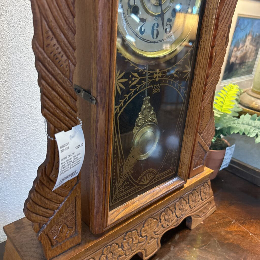 New Haven "Norwich Line" 8-Day Clock, c.1890-1910. New Haven Clock Co. Carved oak, gilt glass, Brass pend.