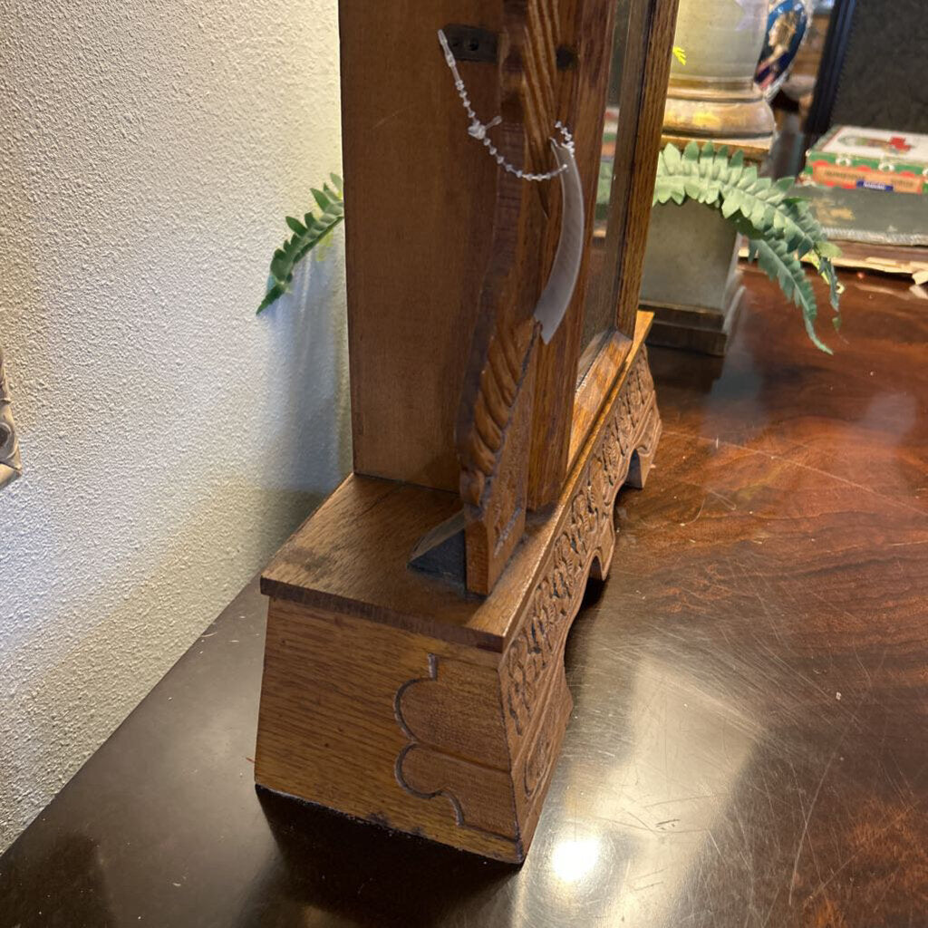 New Haven "Norwich Line" 8-Day Clock, c.1890-1910. New Haven Clock Co. Carved oak, gilt glass, Brass pend.