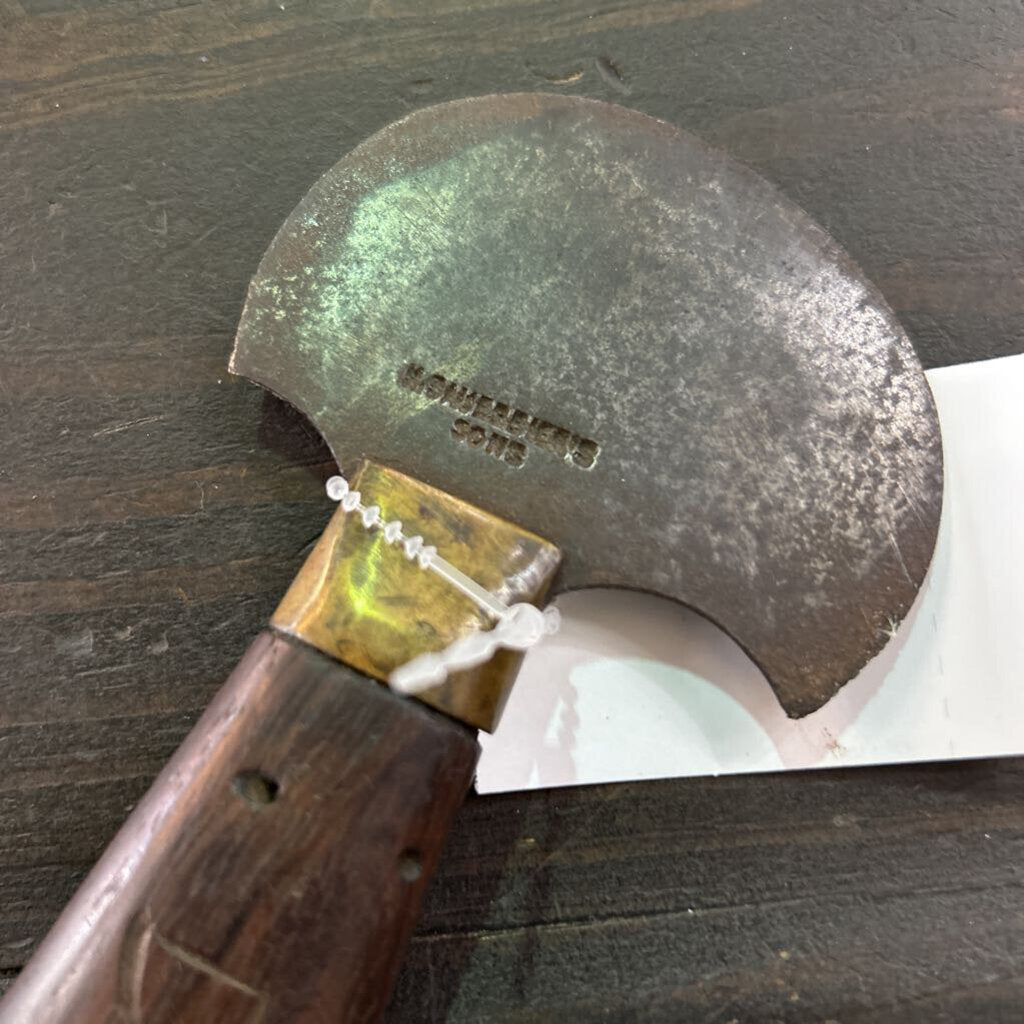 H.Sauerbier's Sons, Round Knife, All in one Cutting tool for leathercraft. c.1875-1887. Hand-forged Carbon Steel, Cast Brass, Rosewood.
