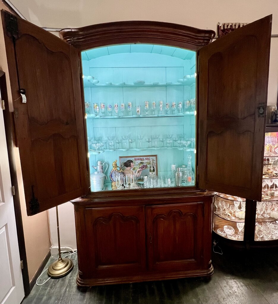 18th Century French Provincial "Buffet a` Deux Corps" with painted and fitted interior for display. Late 18th to early 19th century.