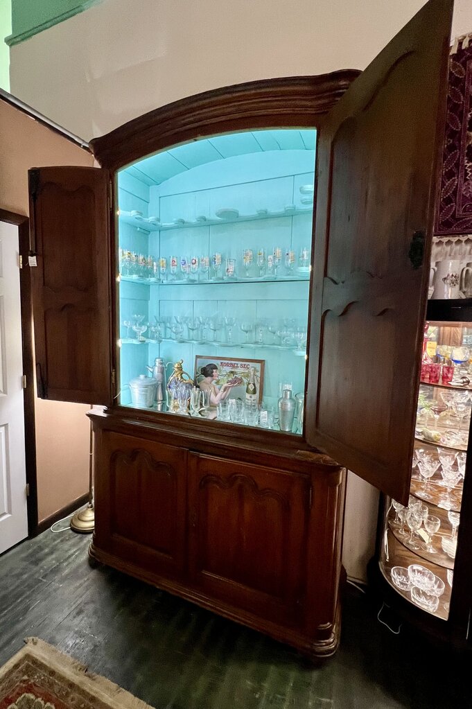 18th Century French Provincial "Buffet a` Deux Corps" with painted and fitted interior for display. Late 18th to early 19th century.