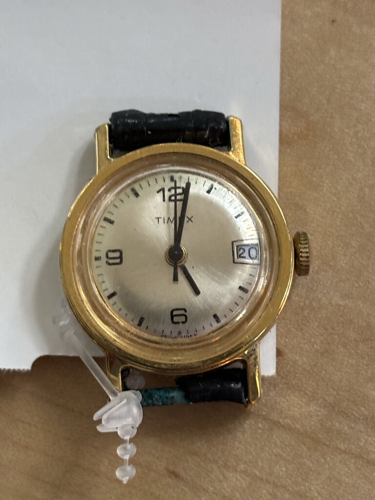 Women's Timex manual wind watch with date; circa 1970s (works)