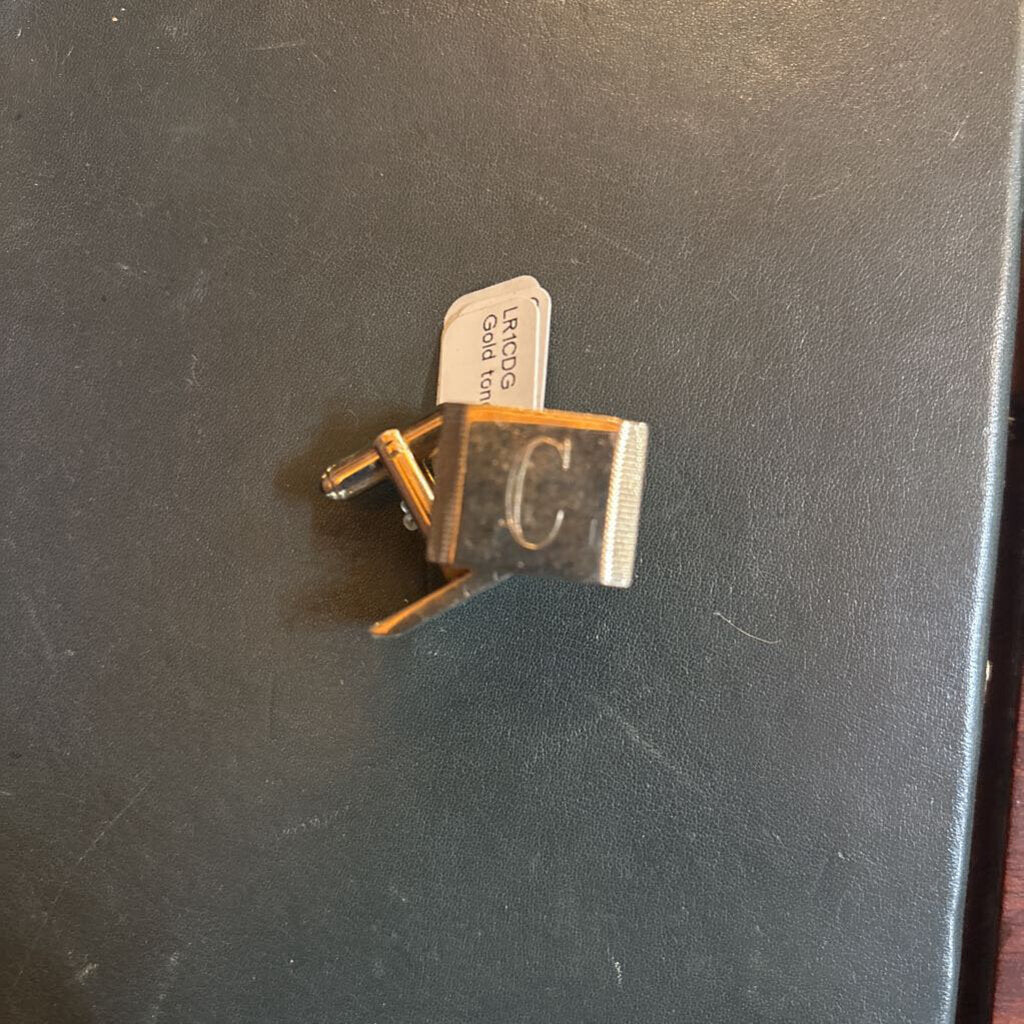 Gold tone rectangle block cufflinks engraved with "C"