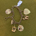 Gold tone charm bracelet