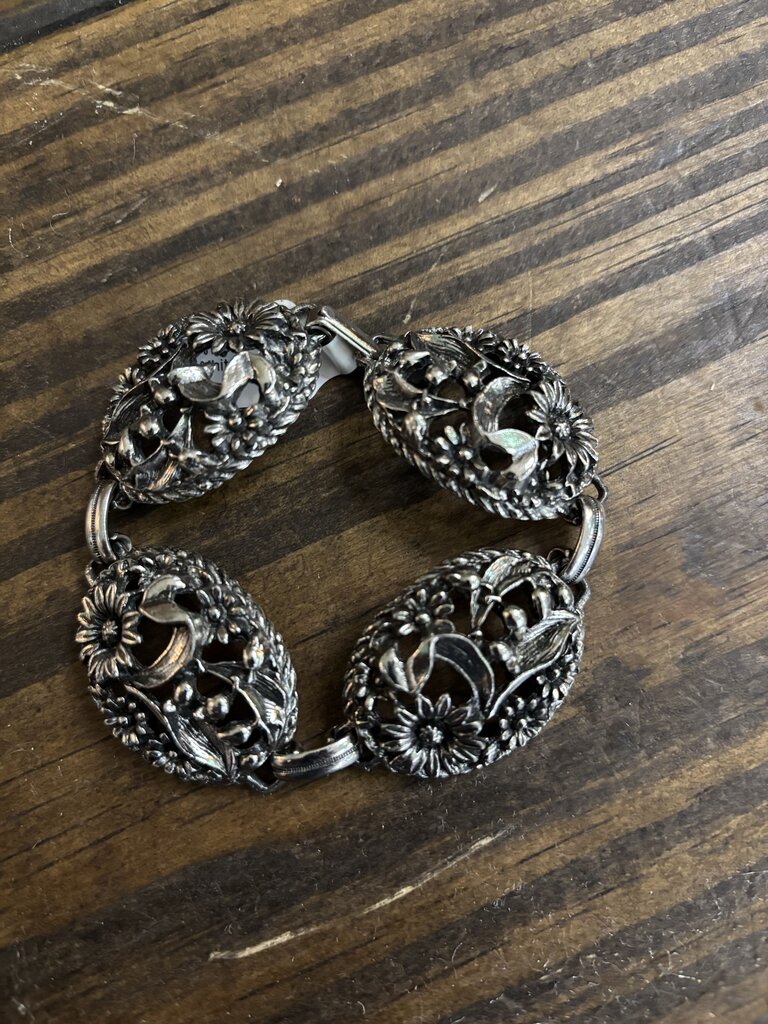 White Metal Bracelet w/ Sculptural Floral Roundels