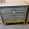 French Provincial/Hollywood Regency style Three Drawer side chest or nightstand; painted and partial gilt; circa 1960s