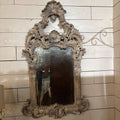 Solid wood, hand carved Rococo revival mirror with a whitewashed finish. Circa 1960-80.