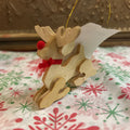 Handmade Christmas Reindeer wooden ornament.