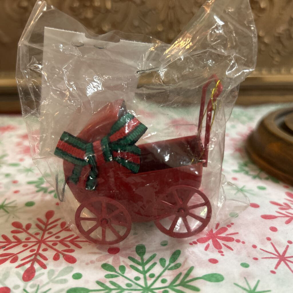 Enesco Red metal baby carriage Christmas ornament, 1981.