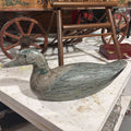Carved wooden distressed duck decoy