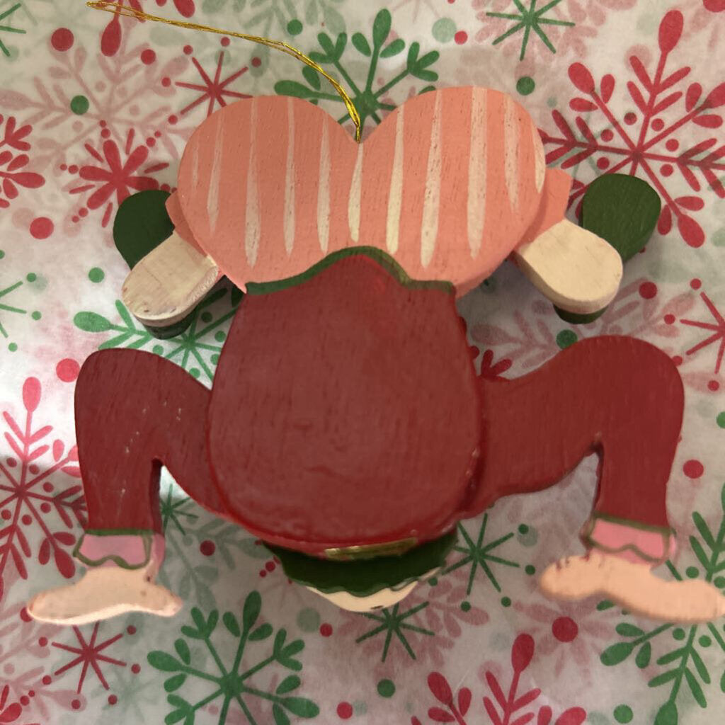 Wooden hand-painted contortionist Christmas ornament.