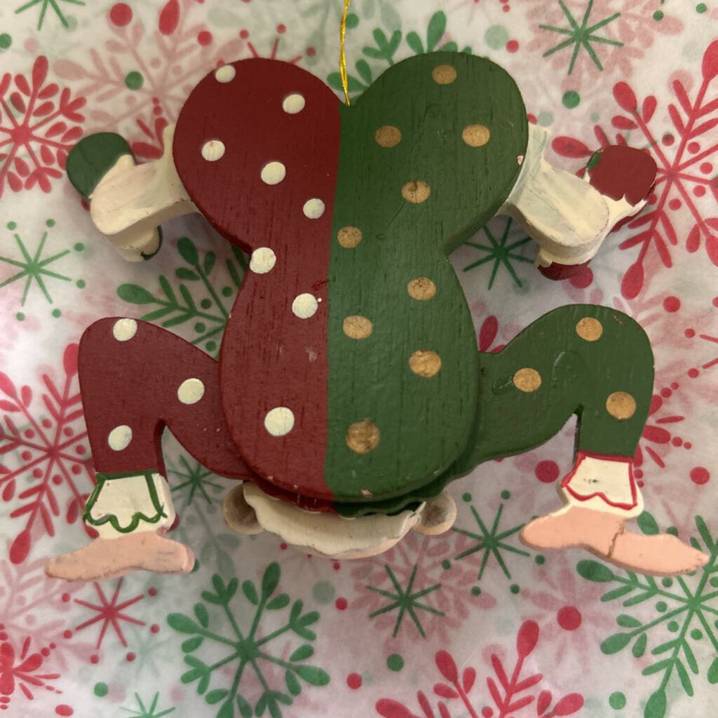Wooden hand-painted contortionist Christmas ornament.