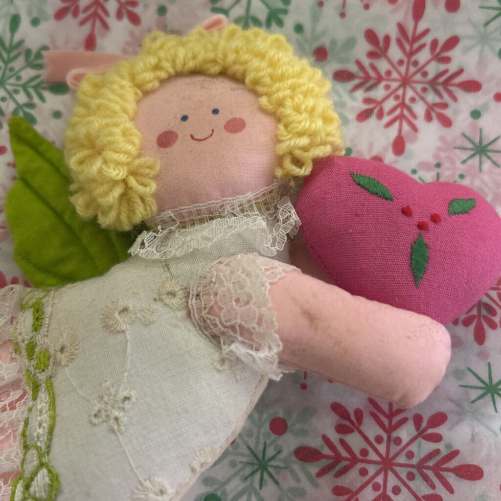 Vintage fabric angel ornament, holding heart.