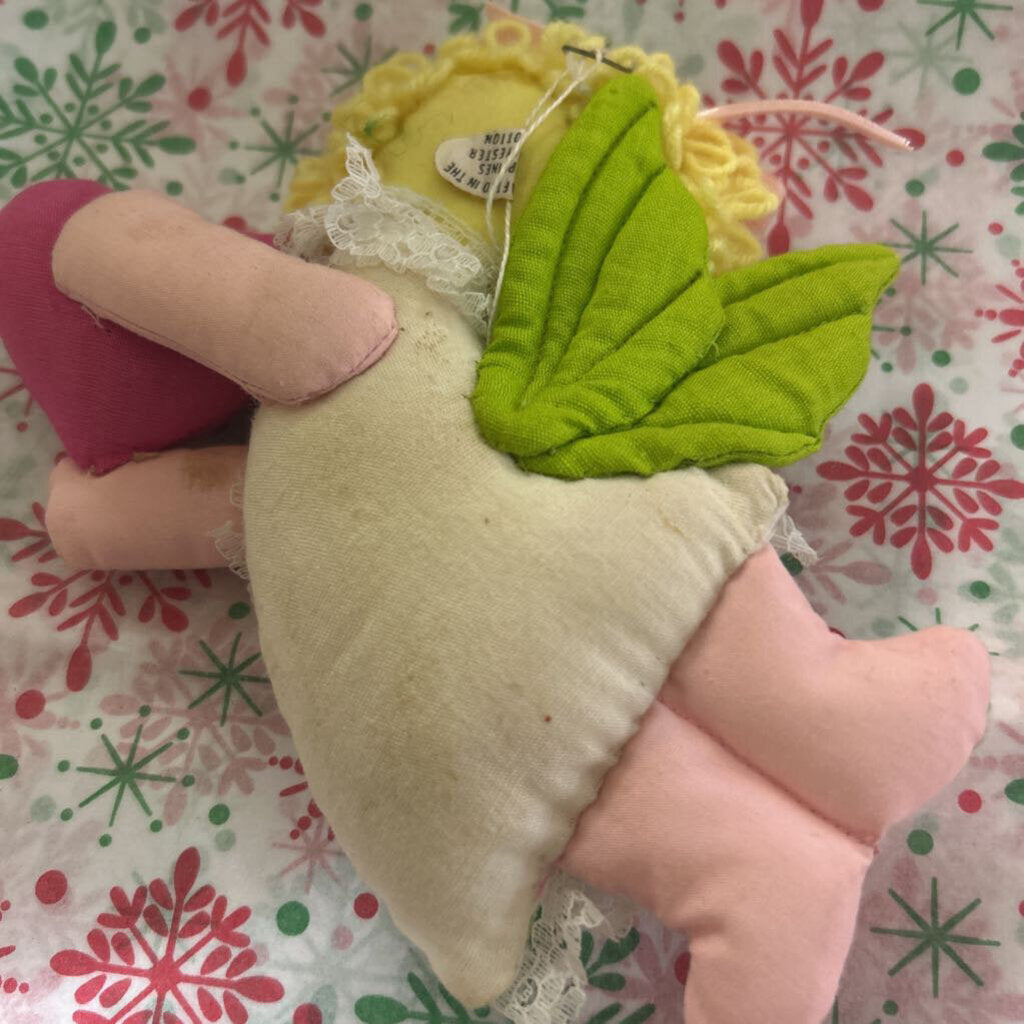 Vintage fabric angel ornament, holding heart.