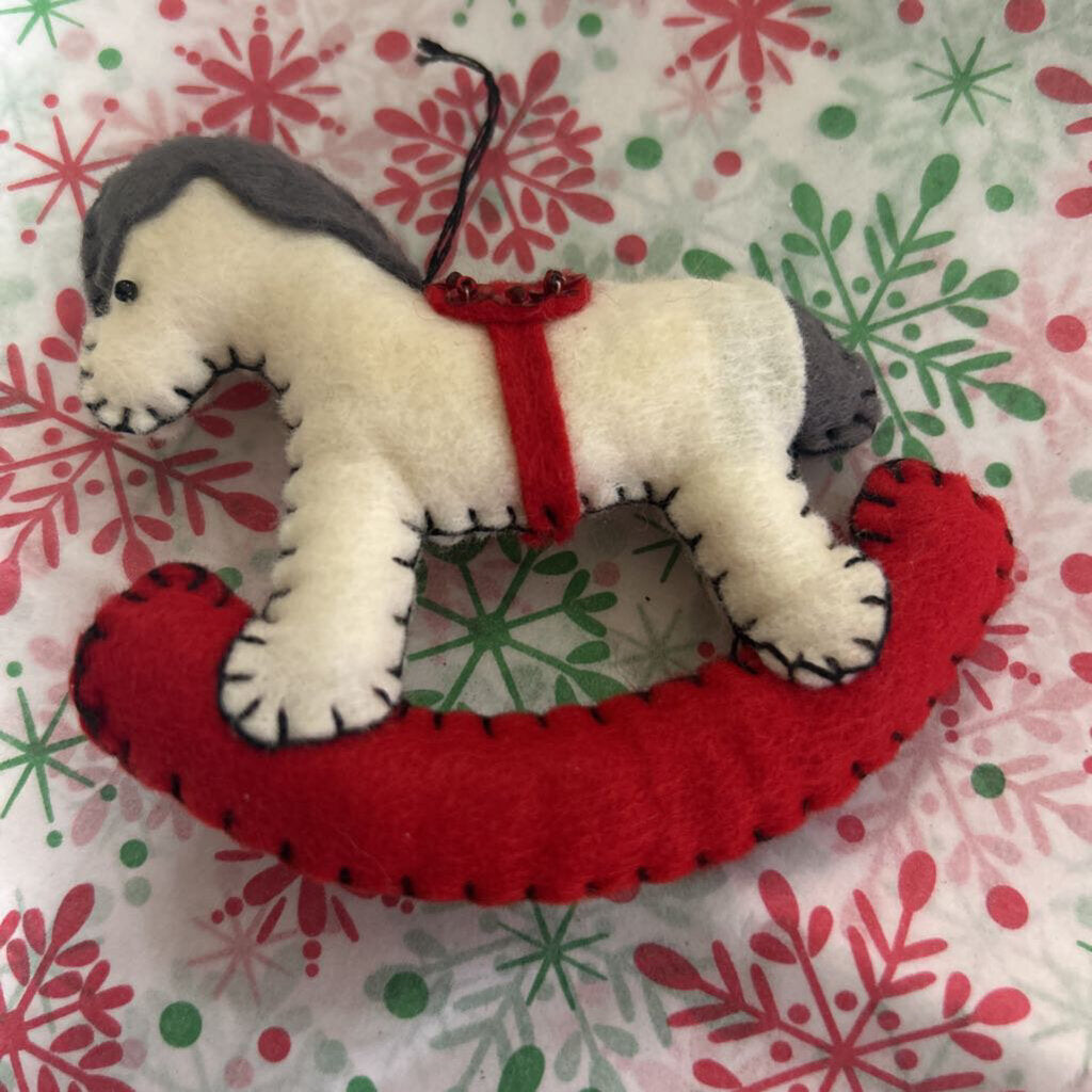 Felt Christmas rocking horse ornament.