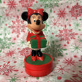 Vintage plastic Minnie Mouse Christmas stamp.