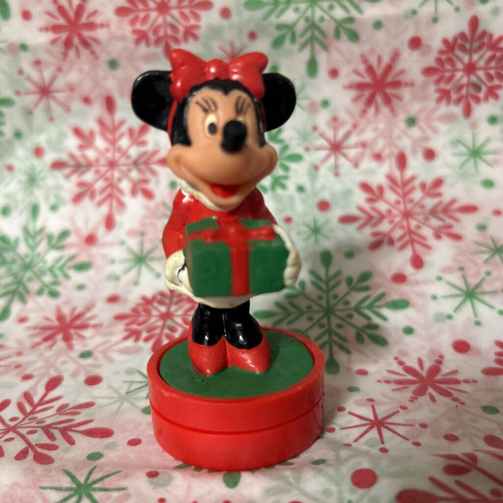 Vintage plastic Minnie Mouse Christmas stamp.